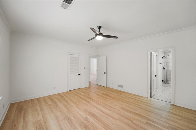 3649 Peachtree Rd NE Unit 305, Atlanta, GA 30319 - unfurnished bedroom with crown molding, light wood-style floors, baseboards, connected bathroom, and ceiling fan