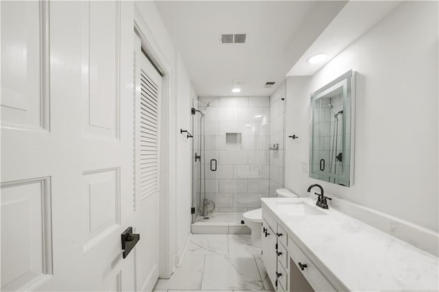3649 Peachtree Rd NE Unit 305, Atlanta, GA 30319 - full bathroom featuring marble look tiles, a shower stall, vanity, toilet, and recessed lighting