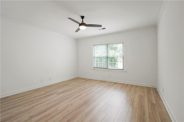 3649 Peachtree Rd NE Unit 305, Atlanta, GA 30319 - empty room with crown molding, light wood finished floors, a ceiling fan, and baseboards