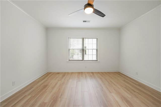 3649 Peachtree Rd NE Unit 305, Atlanta, GA 30319 - spare room featuring crown molding, a ceiling fan, light wood-type flooring, and baseboards