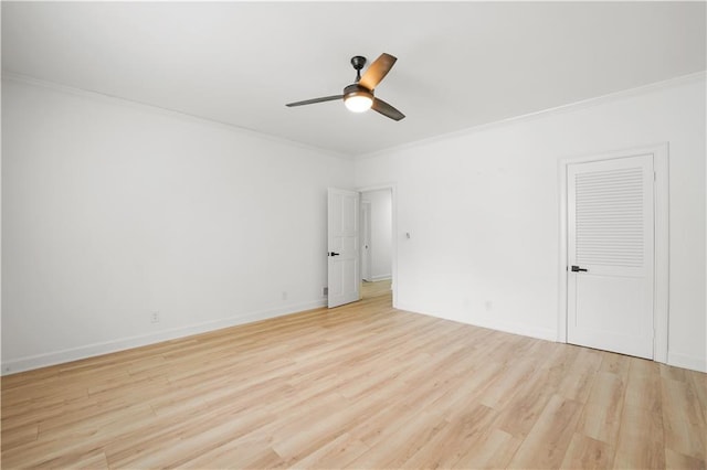 3649 Peachtree Rd NE Unit 305, Atlanta, GA 30319 - empty room with ornamental molding, light wood finished floors, a ceiling fan, and baseboards