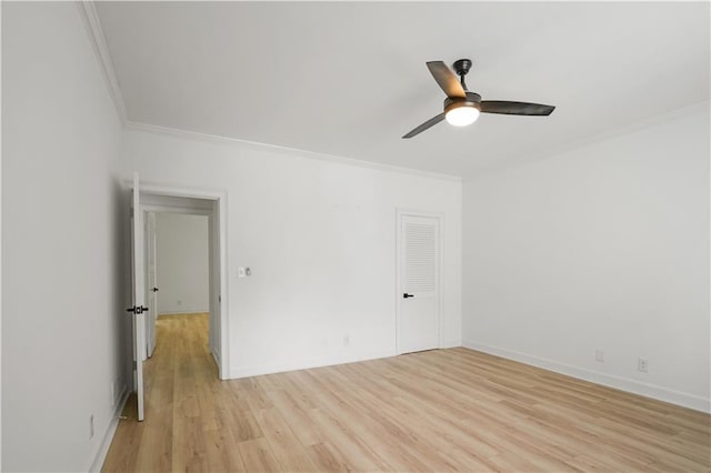 3649 Peachtree Rd NE Unit 305, Atlanta, GA 30319 - empty room featuring ornamental molding, light wood-style floors, ceiling fan, and baseboards