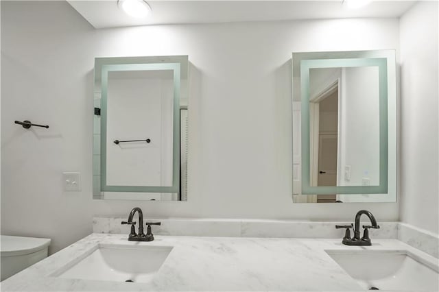 3649 Peachtree Rd NE Unit 305, Atlanta, GA 30319 - full bath featuring toilet and double vanity