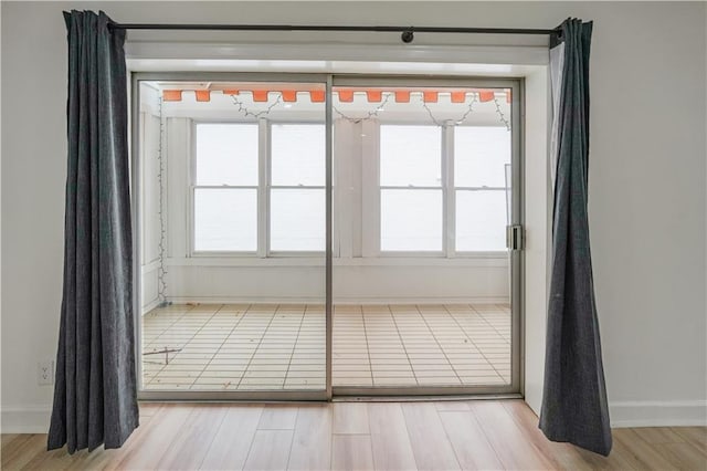 3649 Peachtree Rd NE Unit 305, Atlanta, GA 30319 - unfurnished room featuring baseboards and wood finished floors