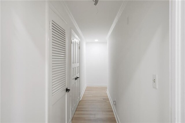 3649 Peachtree Rd NE Unit 305, Atlanta, GA 30319 - hall featuring ornamental molding, light wood-style floors, and baseboards