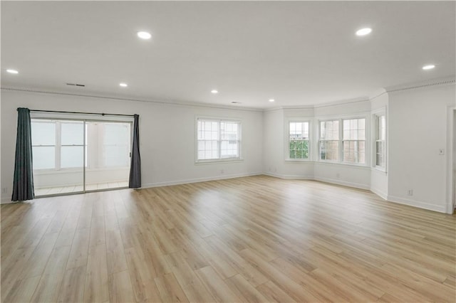 3649 Peachtree Rd NE Unit 305, Atlanta, GA 30319 - spare room featuring crown molding, baseboards, recessed lighting, and light wood-style floors