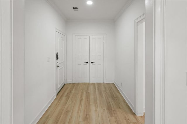 3649 Peachtree Rd NE Unit 305, Atlanta, GA 30319 - hall with light wood-type flooring, crown molding, and baseboards