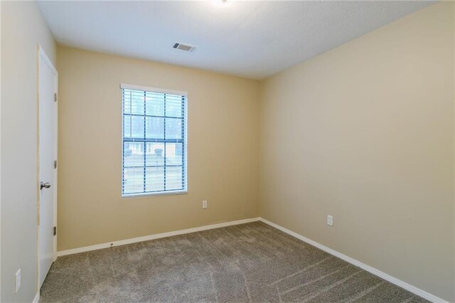 1841 Northwick Pl, Lithonia, GA 30058 - spare room featuring carpet