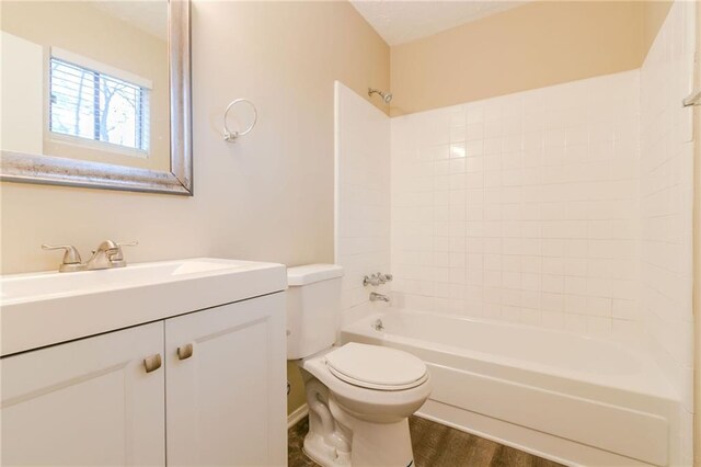 1841 Northwick Pl, Lithonia, GA 30058 - full bathroom featuring hardwood / wood-style floors, vanity, toilet, and shower / bath combination