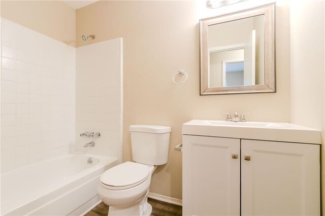 1841 Northwick Pl, Lithonia, GA 30058 - full bathroom featuring vanity, hardwood / wood-style flooring, toilet, and tub / shower combination