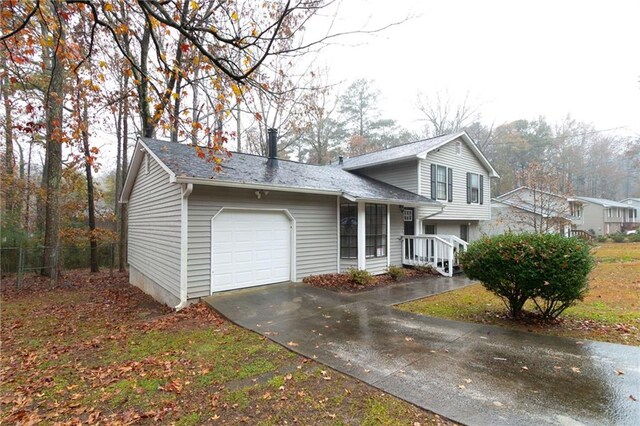 1841 Northwick Pl, Lithonia, GA 30058 - tri-level home with a garage