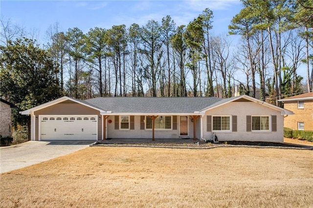 single story home featuring an attached garage, a porch, and concrete driveway