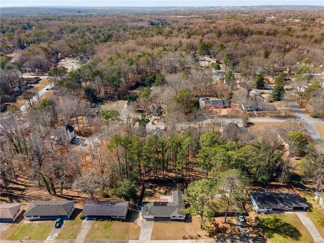 aerial view featuring a view of trees