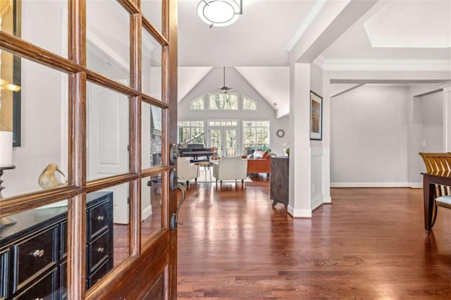 interior space featuring french doors, lofted ceiling, crown molding, dark hardwood / wood-style floors, and ceiling fan