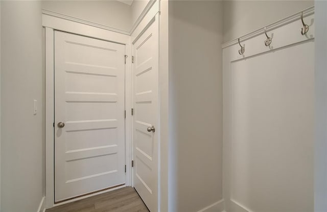 mudroom with wood finished floors