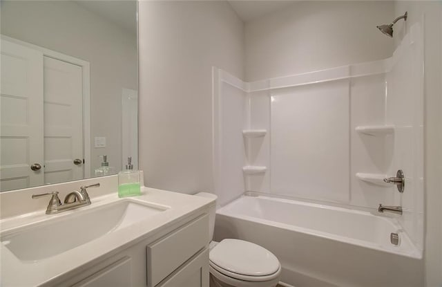 bathroom with toilet, washtub / shower combination, and vanity