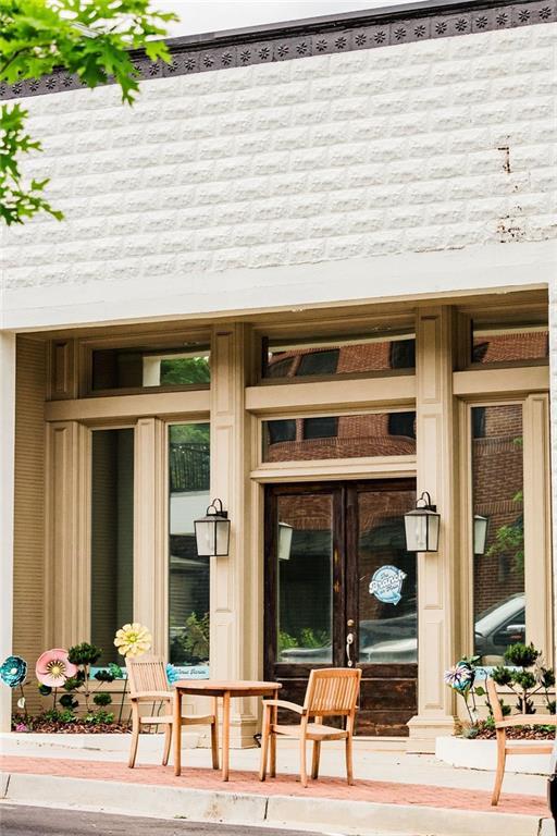 doorway to property with a porch