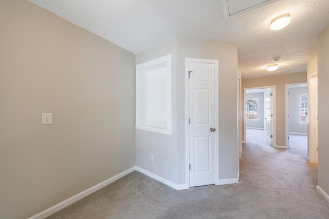 2873 Snapfinger Mnr, Decatur, GA 30035 - hallway featuring carpet floors and a textured ceiling