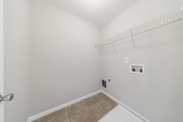 2873 Snapfinger Mnr, Decatur, GA 30035 - washroom with hookup for an electric dryer, hookup for a washing machine, and tile patterned flooring