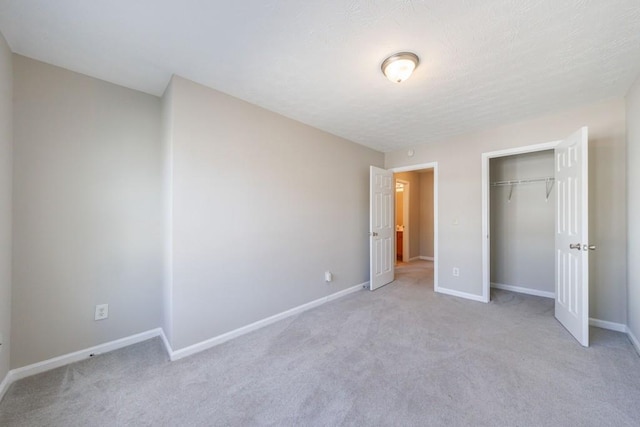 2873 Snapfinger Mnr, Decatur, GA 30035 - unfurnished bedroom featuring light colored carpet and a closet
