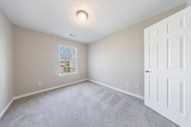 2873 Snapfinger Mnr, Decatur, GA 30035 - spare room with carpet and a textured ceiling