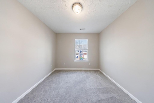2873 Snapfinger Mnr, Decatur, GA 30035 - carpeted empty room featuring baseboards and a textured ceiling