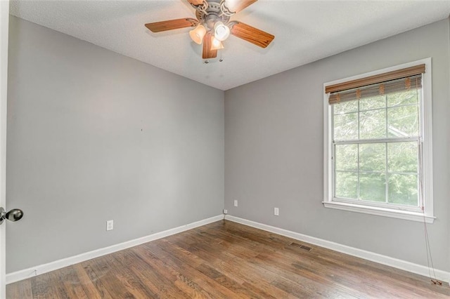200 Wildwood Cir SE, Calhoun, GA 30701 - unfurnished room with baseboards, wood finished floors, and a ceiling fan
