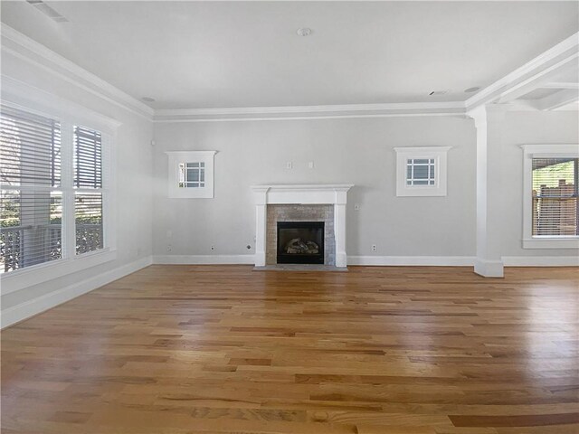 unfurnished living room with ceiling fan, dark wood-type flooring, and baseboards