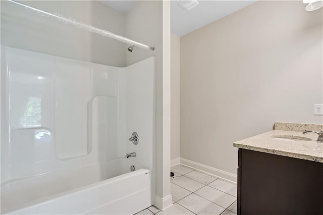 237 Lotus Ln, Covington, GA 30016 - bathroom featuring vanity, bathing tub / shower combination, and tile patterned flooring