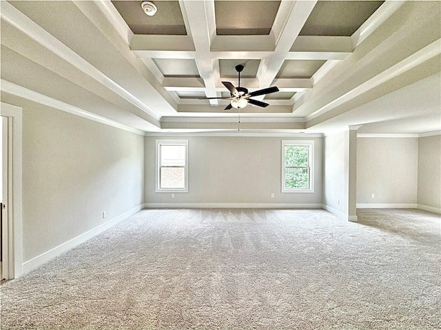 237 Lotus Ln, Covington, GA 30016 - empty room featuring carpet flooring, a ceiling fan, crown molding, coffered ceiling, and beamed ceiling
