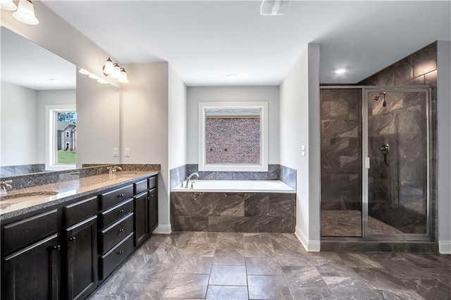 237 Lotus Ln, Covington, GA 30016 - full bath featuring a garden tub, a shower stall, double vanity, and marble finish flooring