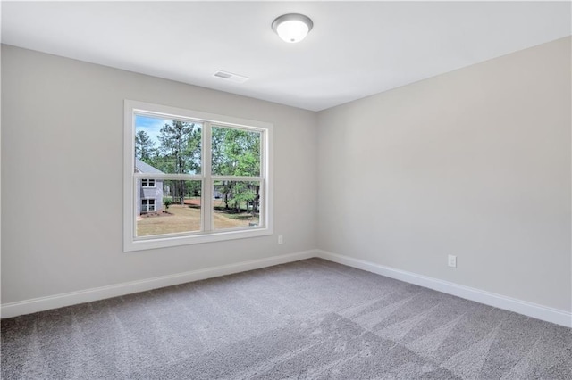 237 Lotus Ln, Covington, GA 30016 - empty room featuring carpet flooring and baseboards