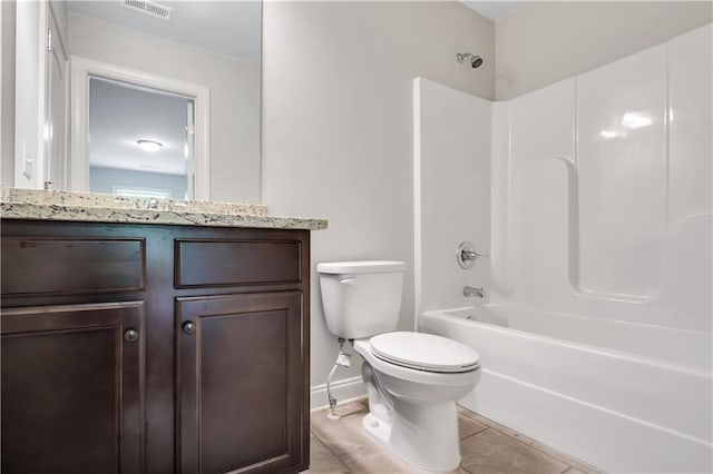 237 Lotus Ln, Covington, GA 30016 - bathroom featuring tile patterned floors, vanity, and bathtub / shower combination