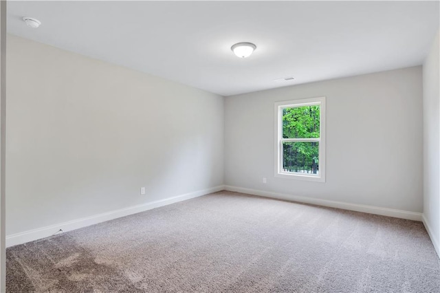 237 Lotus Ln, Covington, GA 30016 - unfurnished room featuring carpet floors and a smoke detector