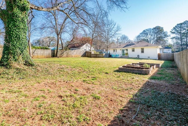 view of yard featuring a fenced backyard