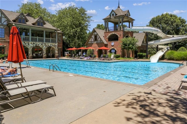 2313 Saint Davids Sq NW Unit 12, Kennesaw, GA 30152 - community pool featuring a water slide and a patio