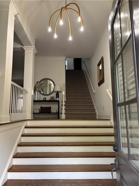 2313 Saint Davids Sq NW Unit 12, Kennesaw, GA 30152 - staircase featuring crown molding and wood finished floors