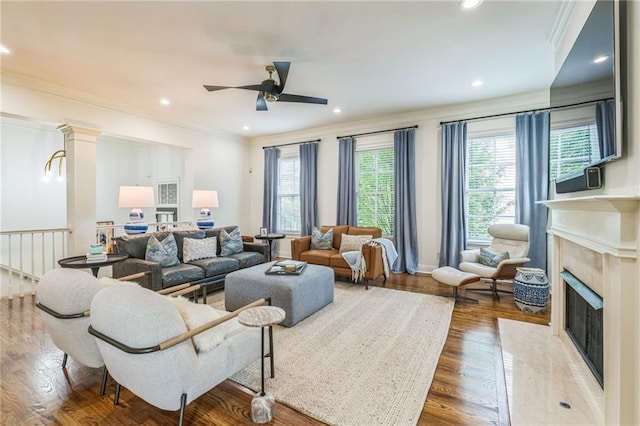 2313 Saint Davids Sq NW Unit 12, Kennesaw, GA 30152 - living room featuring ceiling fan, crown molding, wood finished floors, a fireplace, and recessed lighting