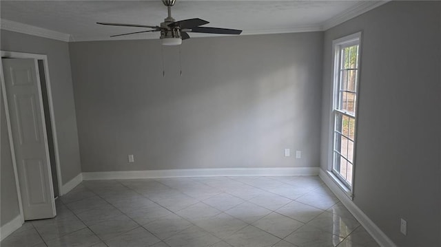 unfurnished room featuring baseboards, ornamental molding, and ceiling fan