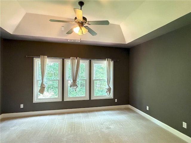 2895 Brandl Cove Ct Unit 4, Marietta, GA 30067 - unfurnished room featuring plenty of natural light, light carpet, a tray ceiling, and ceiling fan