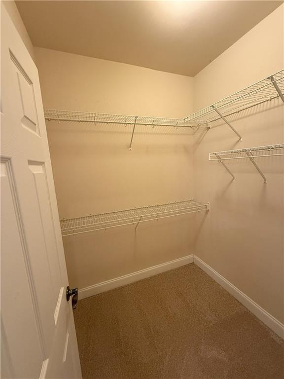 2895 Brandl Cove Ct Unit 4, Marietta, GA 30067 - spacious closet featuring carpet flooring