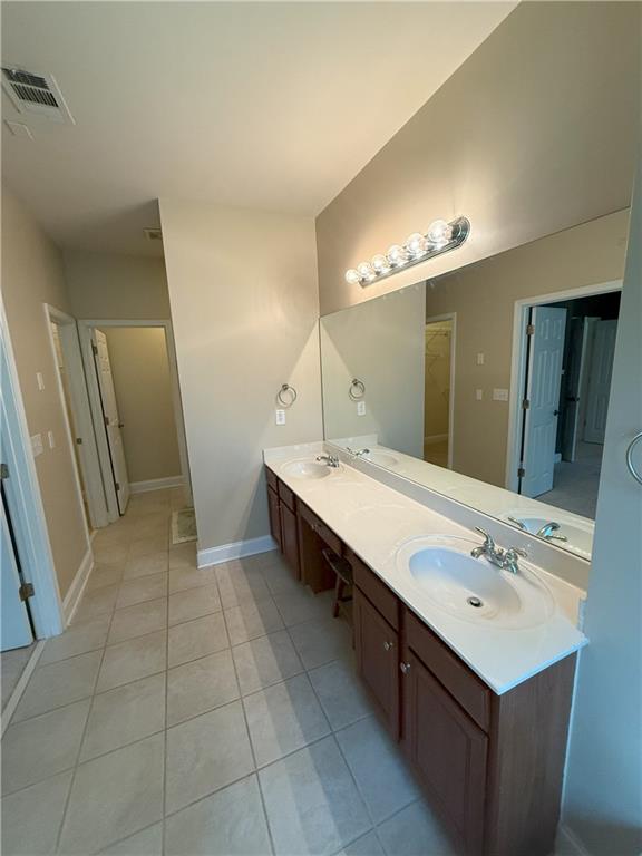 2895 Brandl Cove Ct Unit 4, Marietta, GA 30067 - bathroom featuring double vanity and tile patterned flooring