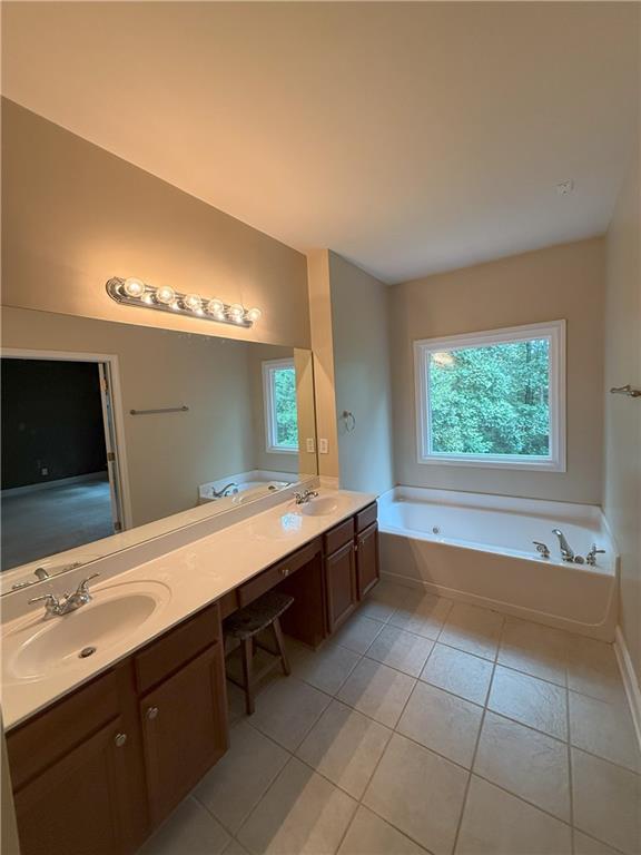 2895 Brandl Cove Ct Unit 4, Marietta, GA 30067 - full bath featuring healthy amount of natural light, double vanity, and a bath