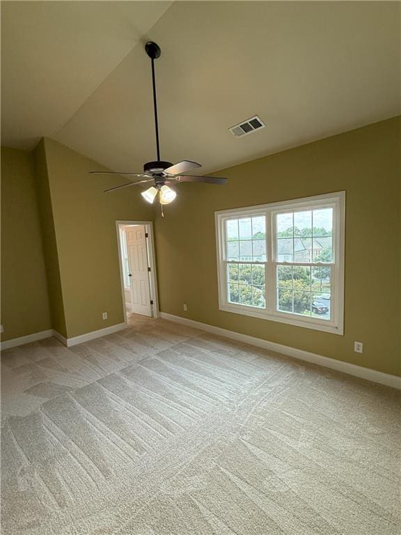 2895 Brandl Cove Ct Unit 4, Marietta, GA 30067 - spare room with ceiling fan, vaulted ceiling, and light colored carpet