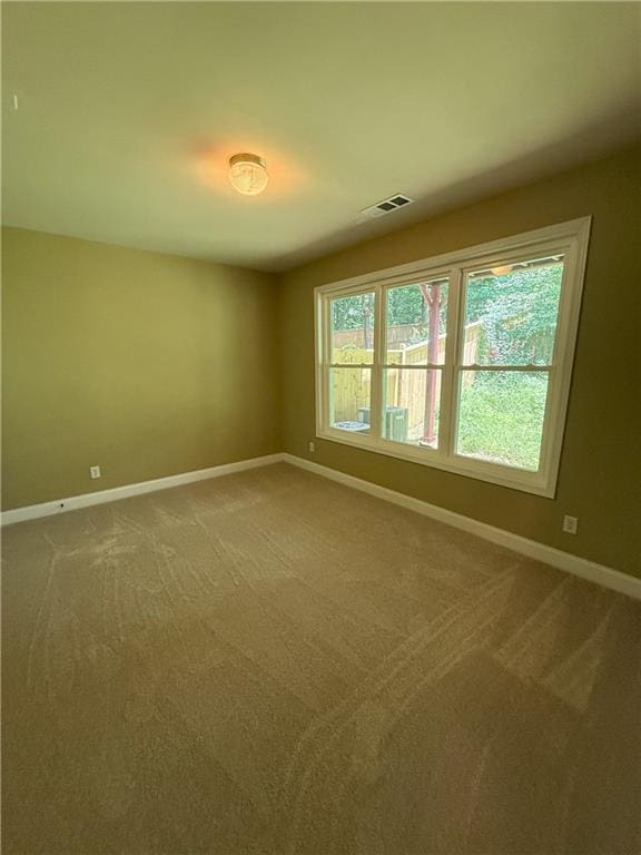 2895 Brandl Cove Ct Unit 4, Marietta, GA 30067 - empty room featuring carpet flooring