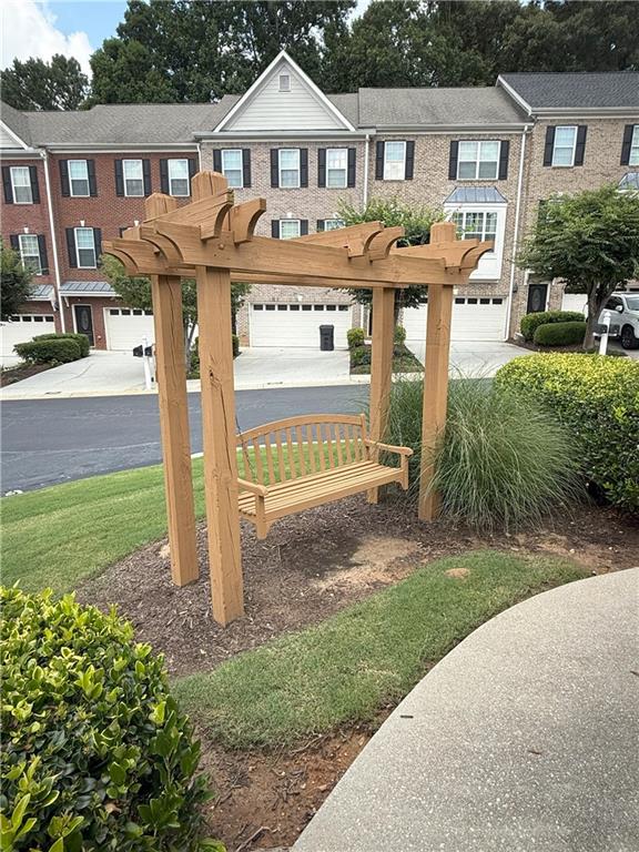 2895 Brandl Cove Ct Unit 4, Marietta, GA 30067 - view of yard with a garage and driveway