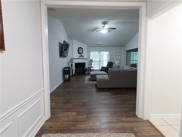 550 Sessingham Ct, Alpharetta, GA 30005 - living area featuring lofted ceiling, a ceiling fan, dark wood-type flooring, and a fireplace