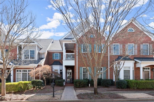 view of front of property featuring brick siding