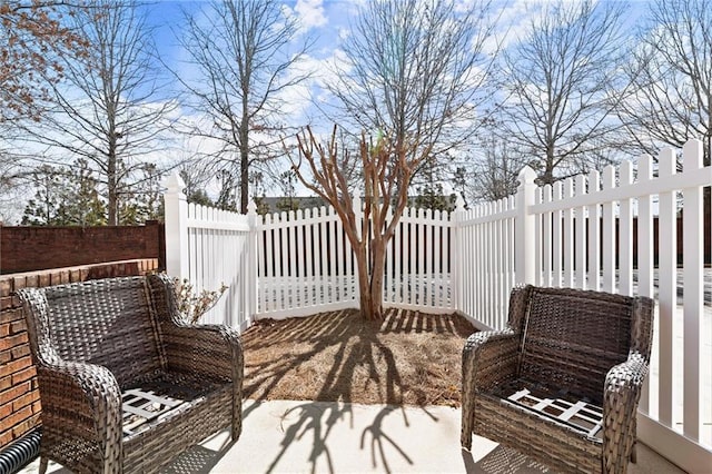 view of patio featuring a fenced backyard