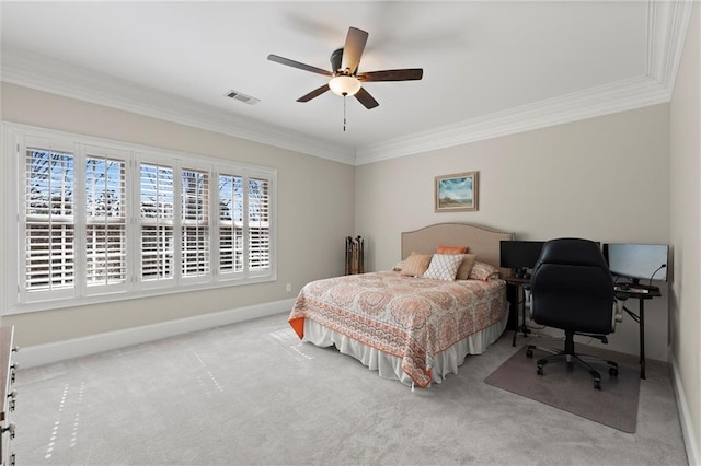 bedroom featuring ceiling fan, carpet floors, visible vents, baseboards, and crown molding